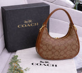Coach Style Moon Bag