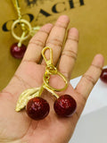 Sparkling Cherry Charm Keychain – A Touch of Sweet Luxury