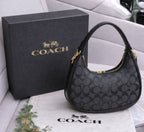 Coach Style Moon Bag