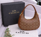 Coach Style Moon Bag
