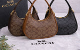 Coach Style Moon Bag